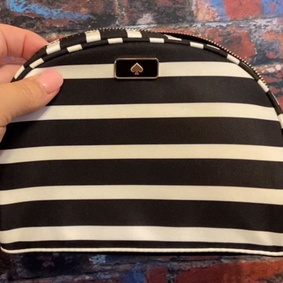 kate spade Handbags - Kate Spade B/W Stripe Medium Dome Cosmetic Bag